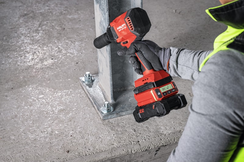 Worker checking the anchor installation status on Hilti SIW 6AT-22