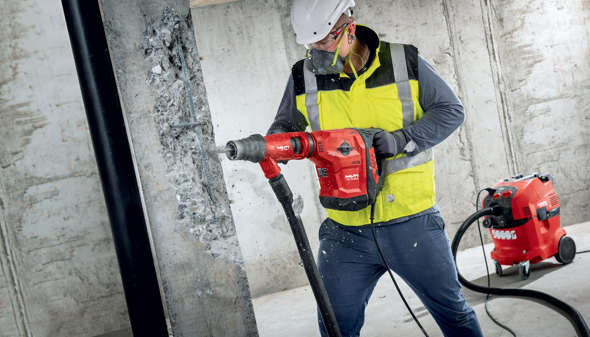 Worker chipping concrete with TE 70-ATC rotary hammer